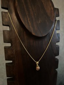 Gold Necklace with Amber Bead Pendant