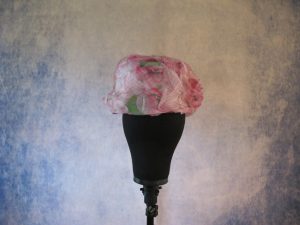 Pink and green hat